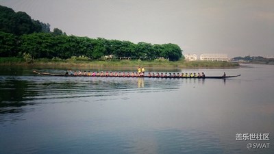 《端午習(xí)俗》+廣東廣州市+劃龍舟包棕子